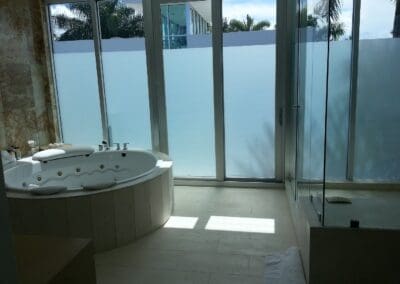 A bathroom with decorative window films