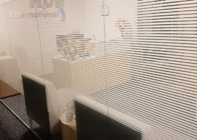 An office window with window film similar to blinds