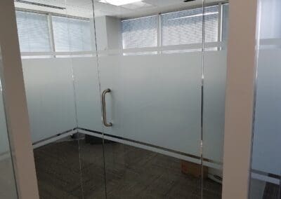 A glass door with a window film