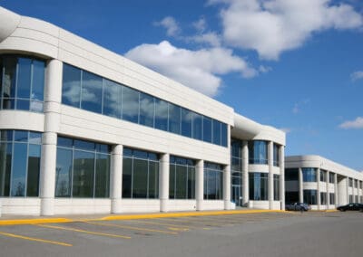 A large building with many windows on the outside.